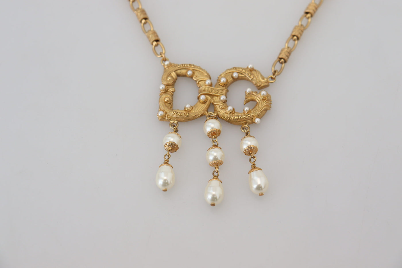 Gold Tone Brass Chain Faux Pearl Logo Pendant Necklace