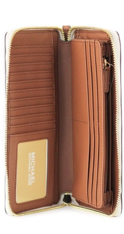 Jet Set Travel Large Vanilla Signature Continental Wristlet Wallet